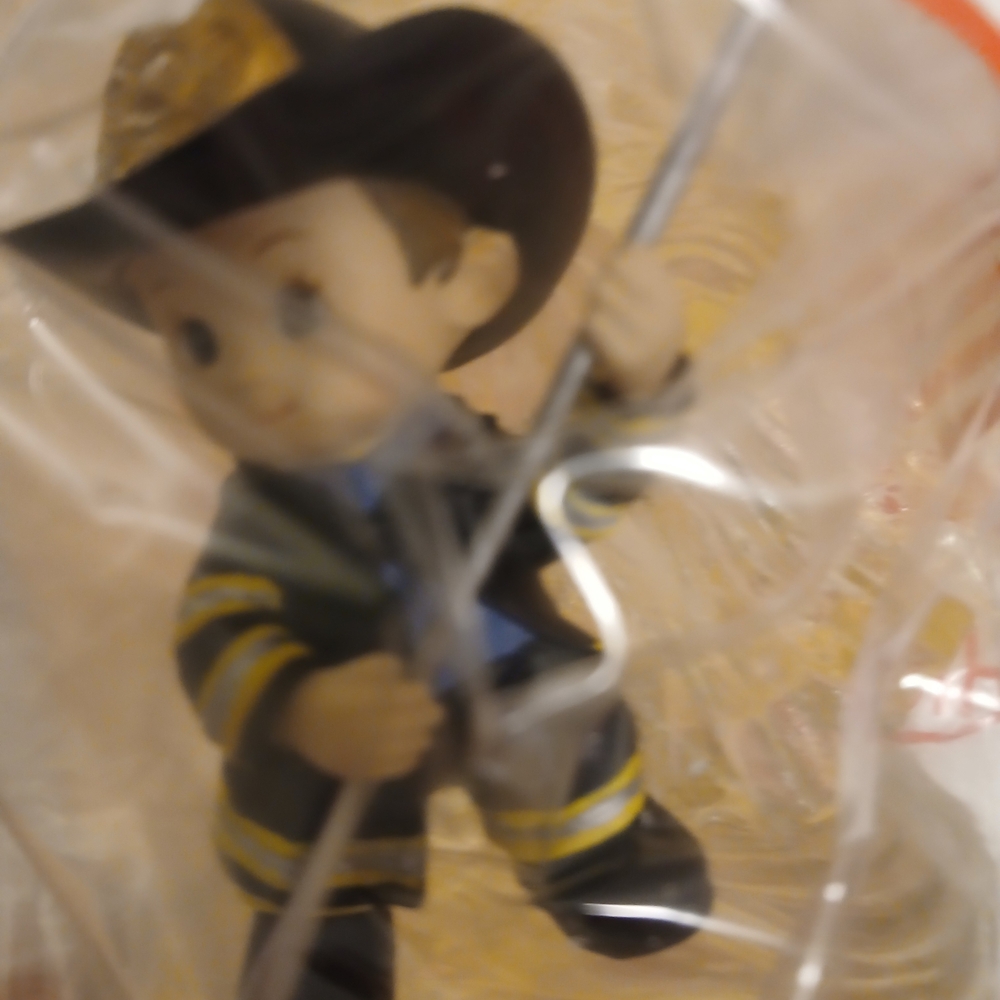 Firefighter Ceramic Figurine